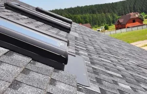 Close up on attic skylight window repair with waterproofing memb